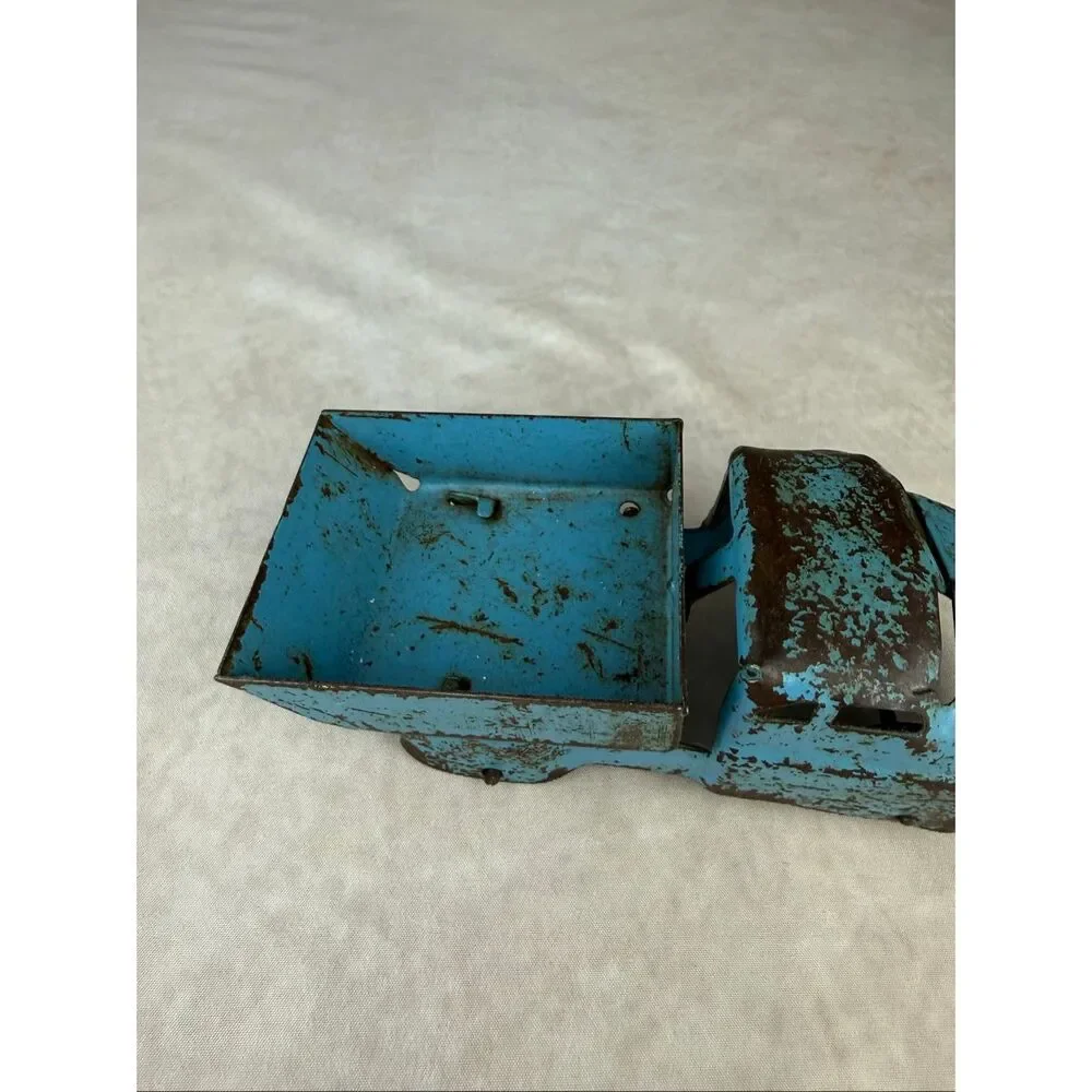 Vintage 6in Blue Wyandotte Pressed Steel Dump Truck Toy READ